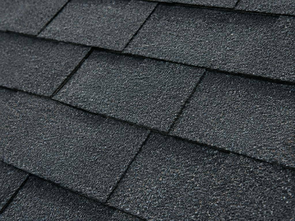 Close-up of clean asphalt shingles with their granules intact